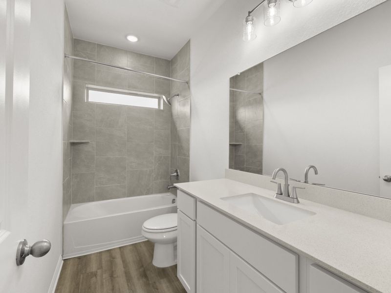 Furnished interior view inside a new home in Crosswinds, Kyle (Image 9).