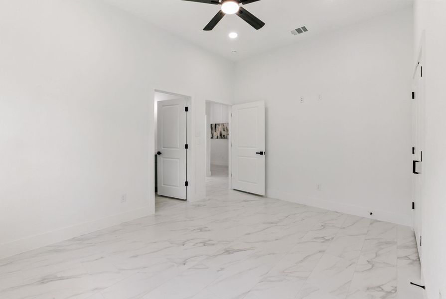 Bedroom 3 and a full bathroom