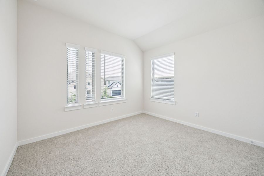 Bedroom in the Claret home plan by Trophy Signature Homes – REPRESENTATIVE PHOTO Bedroom in the Claret home plan by Trophy Signature Homes – REPRESENTATIVE PHOTO
