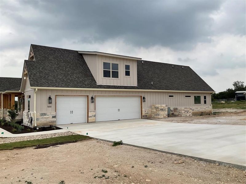 3-car garage and wide driveway allow extra parking space