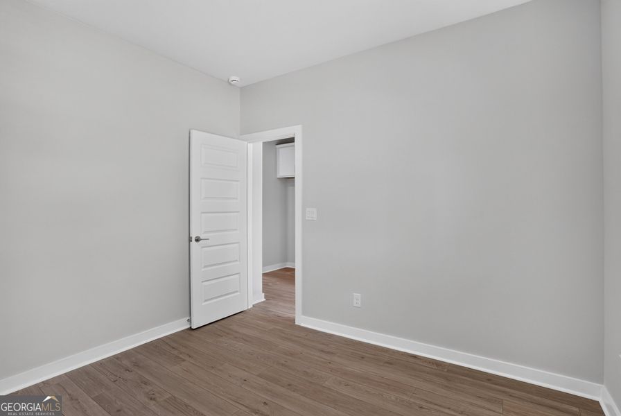 Spacious, unfurnished interior of a new home in The Cottages at East Lanier, Fayetteville (Image 18).