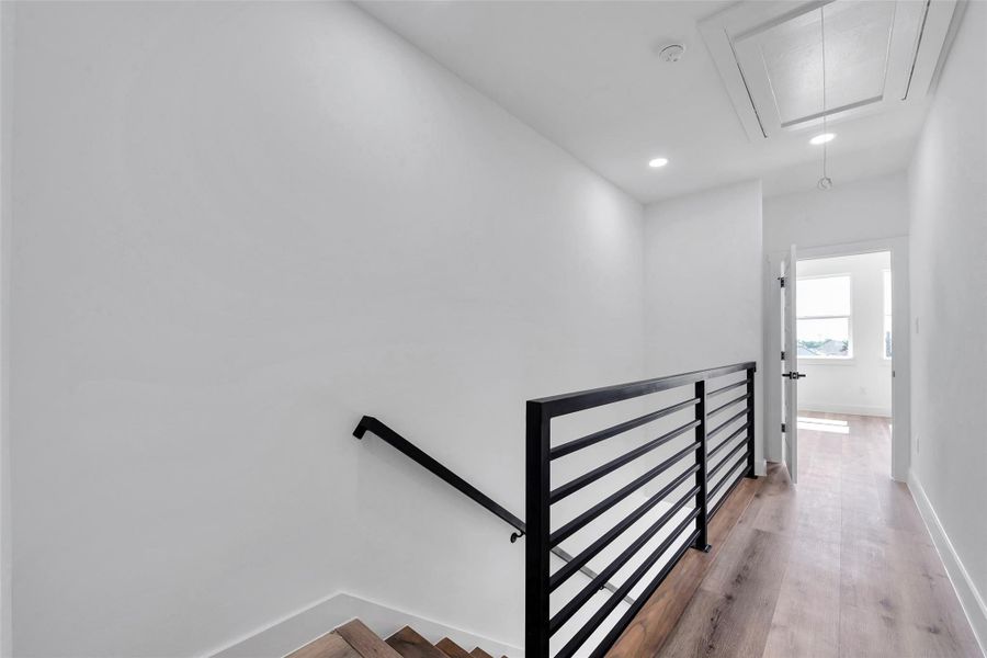 The hallway leads you to the owner's retreat which includes a large bedroom and an ensuite bath.