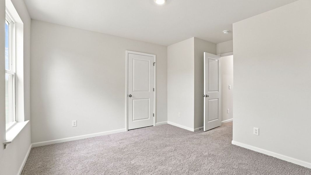 Spacious, unfurnished interior of a new home in Carter Ridge, Greenville (Image 27).