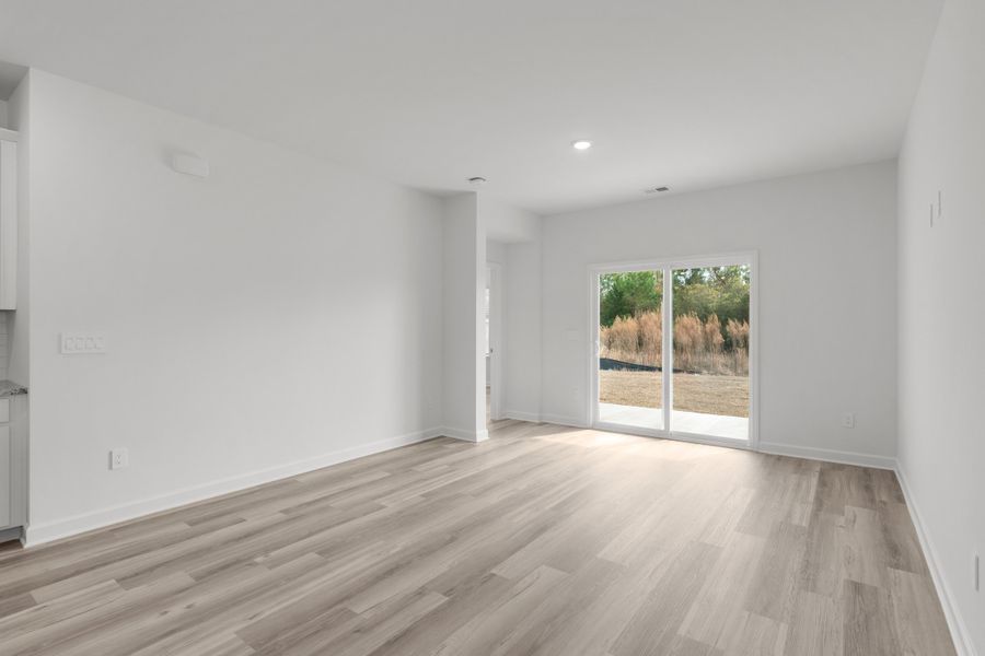 Spacious, unfurnished interior of a new home in Cypress Ridge - The Boardwalk Series, Longs (Image 13).