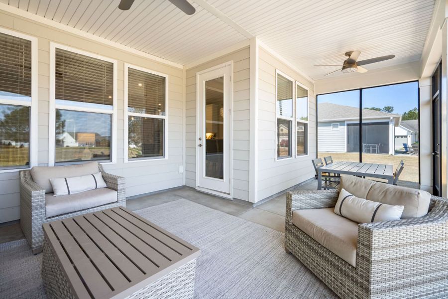 Exterior details and patio area of a home in Sun City Hilton Head, Bluffton (Image 24).