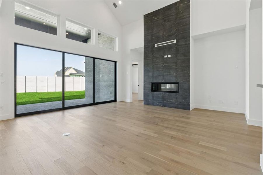 You'll enjoy easy indoor-outdoor living with a full wall slider in your new family room!