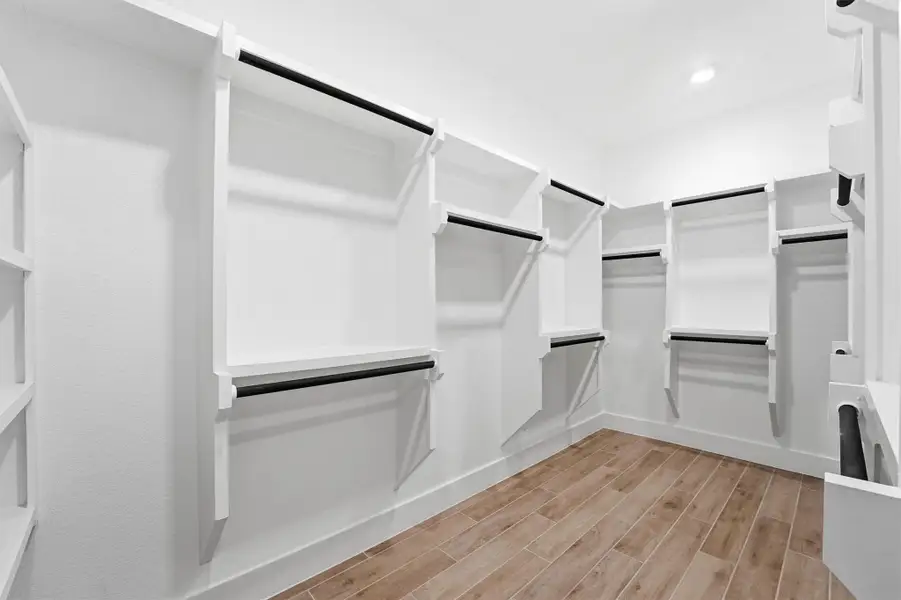 Furnished interior view inside a new home in Bridgeland, Cypress (Image 4).