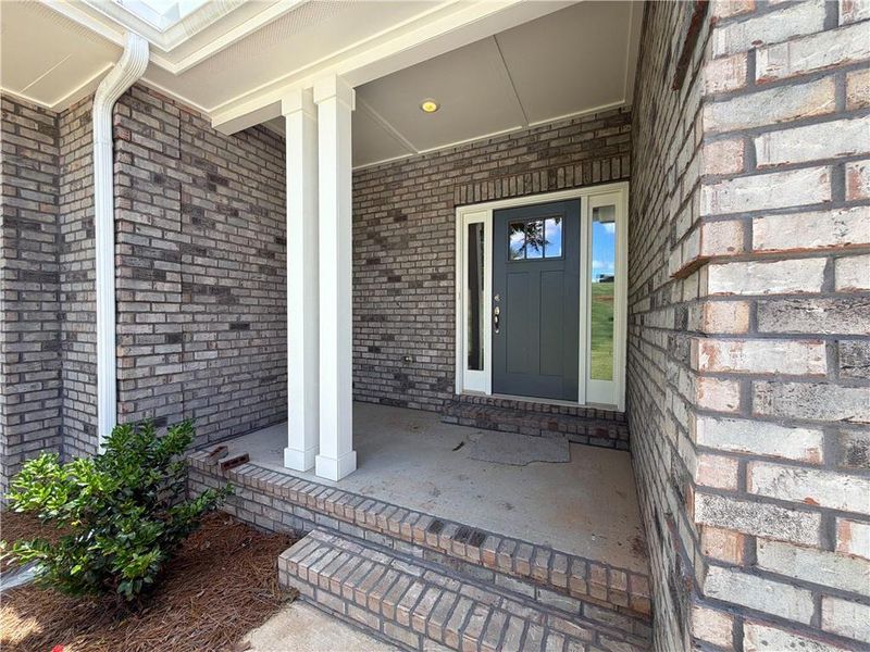 Exterior details and patio area of a home in Tuscany Hills, Douglasville (Image 19).
