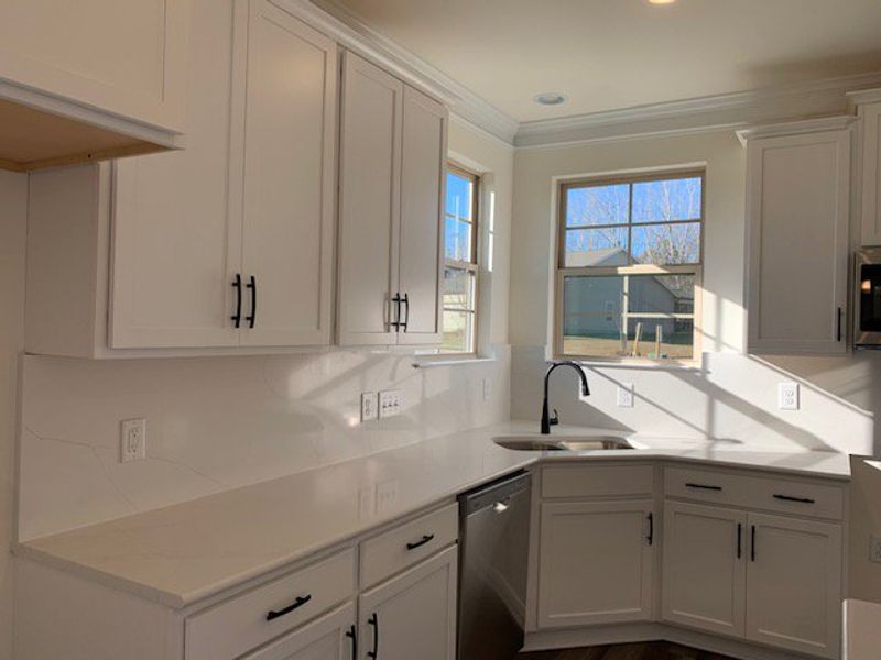 Furnished interior view inside a new home in Royal Pines, Trinity (Image 6).