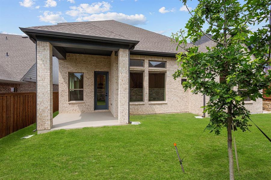 Front exterior of a new home in Walsh Classic, Fort Worth, TX, highlighting curb appeal (Image 1). Front exterior of a new home in Walsh Classic, Fort Worth, TX, highlighting curb appeal (Image 1).