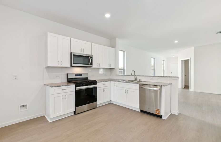 Furnished interior view inside a new home in Mavera, Conroe (Image 6).