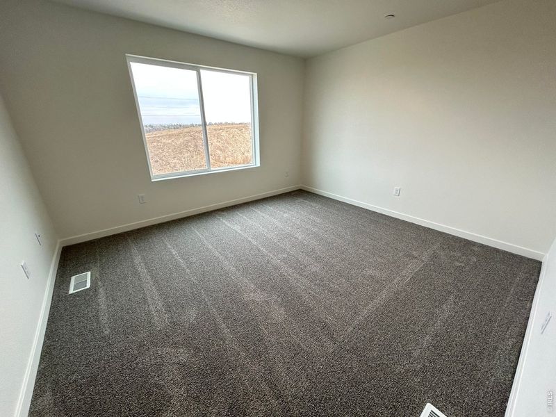 Spacious, unfurnished interior of a new home in Liberty Draw, Evans (Image 9).