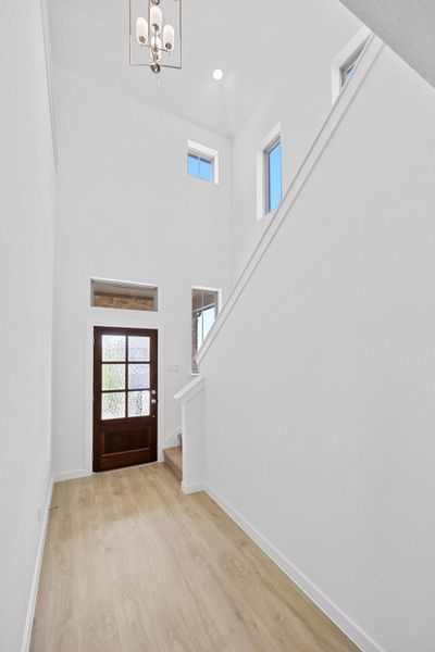 Entry in the Oak home plan by Trophy Signature Homes – REPRESENTATIVE PHOTO Entry in the Oak home plan by Trophy Signature Homes – REPRESENTATIVE PHOTO