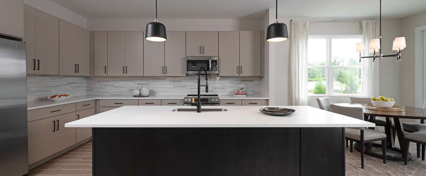 Representative furnished interior of a home built from the Taborfield by Ashton Woods in Ellington Classical, St. Cloud (Image 7).