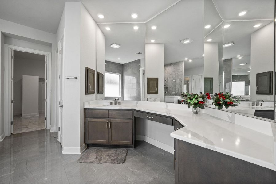 Full bath featuring vanity and a stall shower