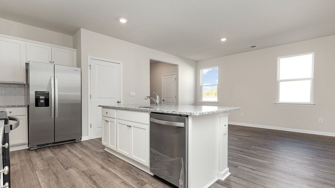 Furnished interior view inside a new home in Sandridge Park, Little River (Image 5).