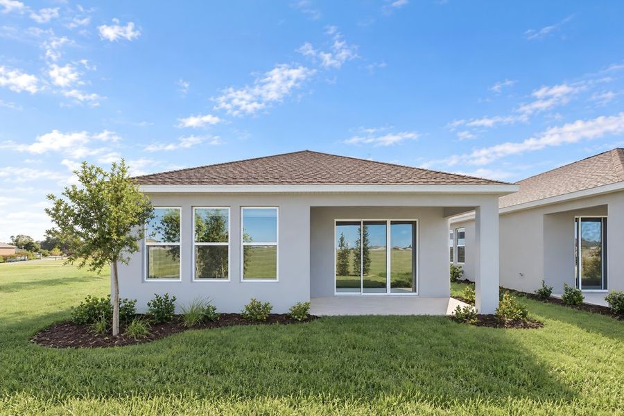 Exterior details and patio area of a home in Lochside, Mount Dora (Image 32).