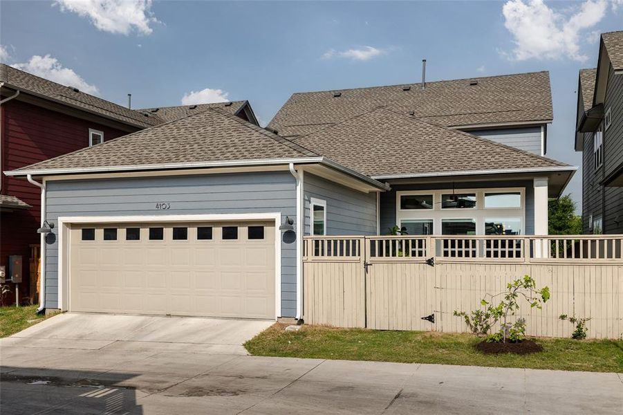 Garage access from behind the home.