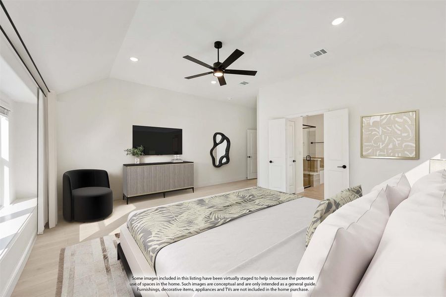 Master bedroom with vaulted ceiling, ceiling fan, and open ensuite bathroom door Master bedroom with vaulted ceiling, ceiling fan, and open ensuite bathroom door