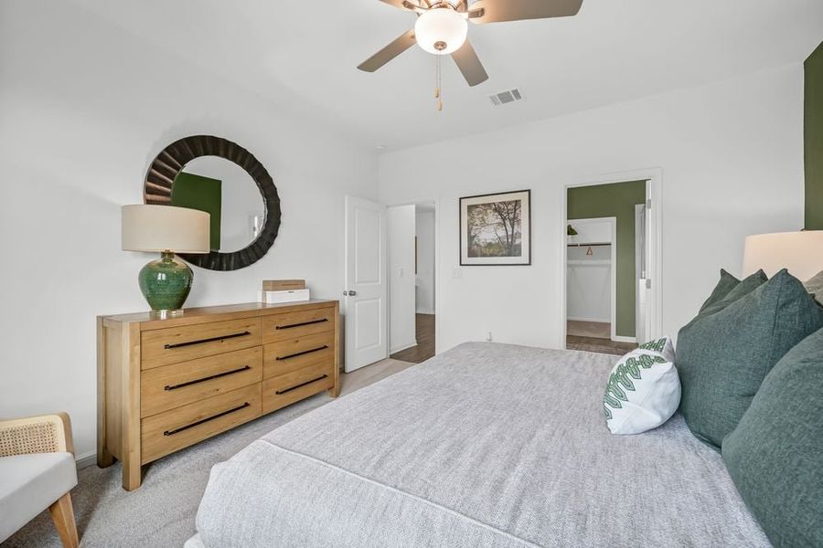Representative furnished interior of a home built from the Robin by Taylor Morrison in Longview 50s, Del Valle (Image 14).
