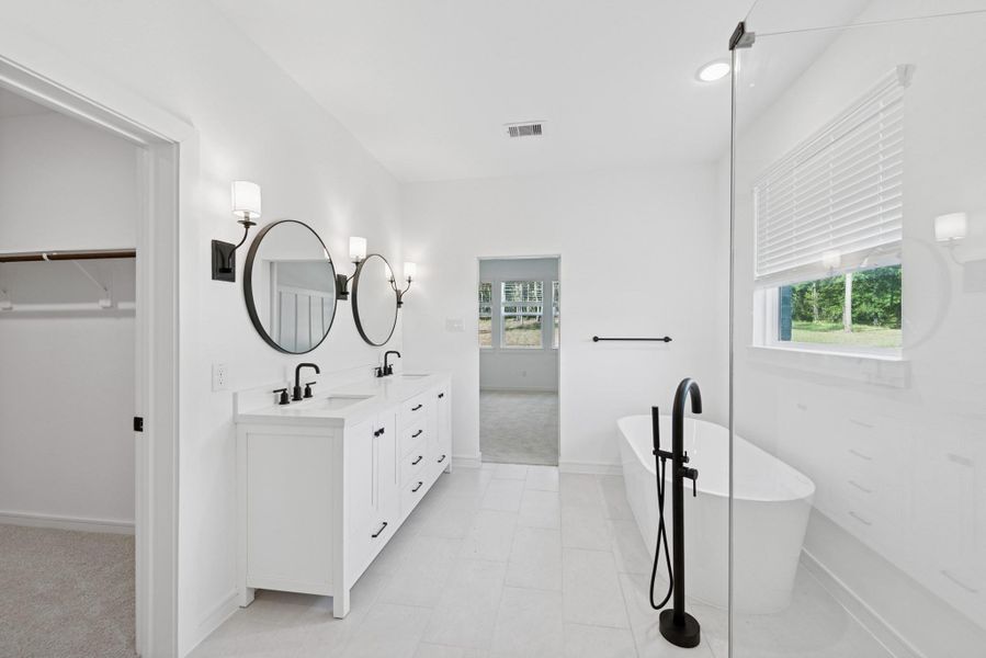 Serene primary suite (*Photo not of actual home and used for illustration purposes only.)