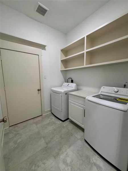 Utility Room connects house to garage