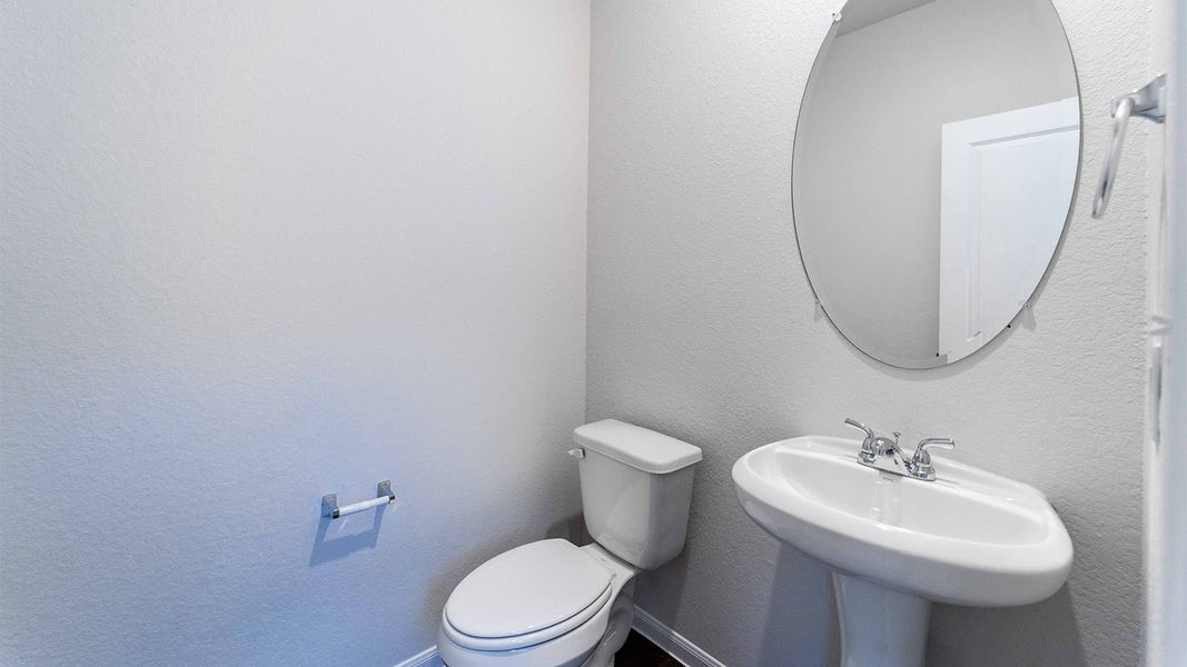 Furnished interior view inside a new home in The Canopies, Splendora (Image 9).
