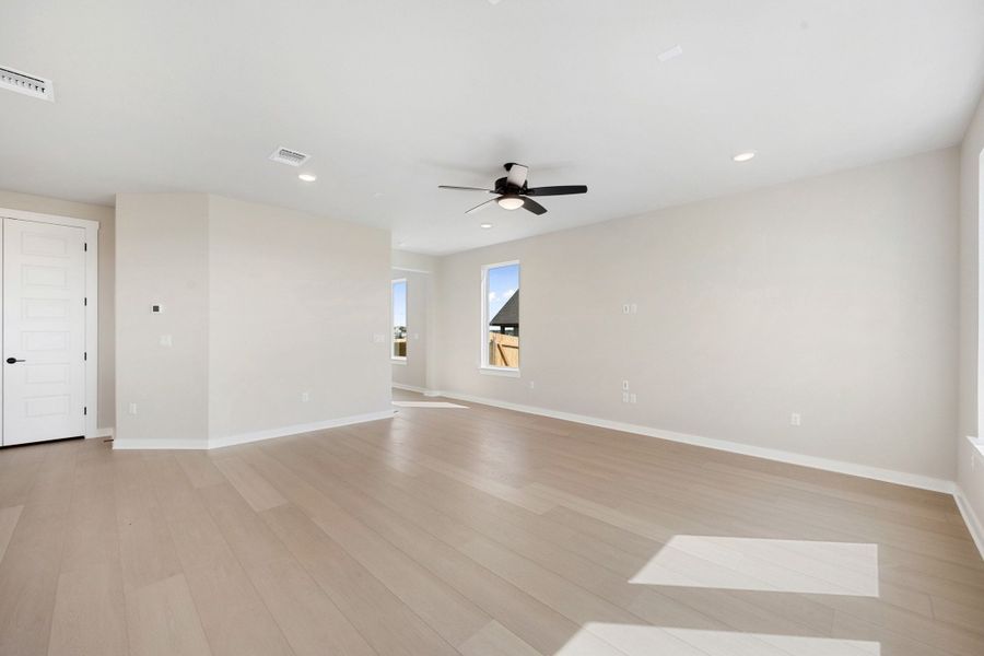 Spacious, unfurnished interior of a new home in Terrace Collection At Turner's Crossing, Buda (Image 31).