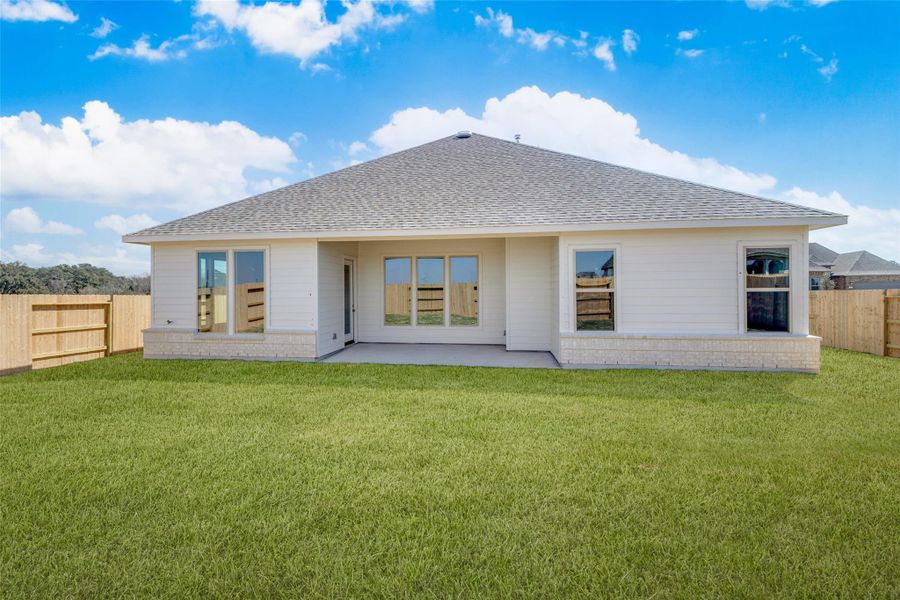 Exterior details and patio area of a home in , Sealy (Image 3).