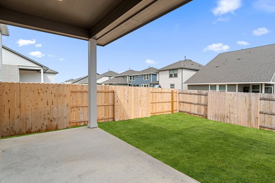 Exterior details and patio area of a home in Arbor Collection at Lariat, Liberty Hill (Image 3).