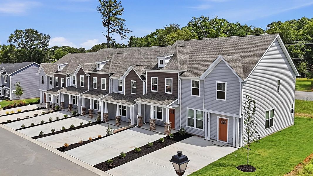Front exterior of a new home in Clarke Townes, Anderson, SC, highlighting curb appeal (Image 21). Front exterior of a new home in Clarke Townes, Anderson, SC, highlighting curb appeal (Image 21).