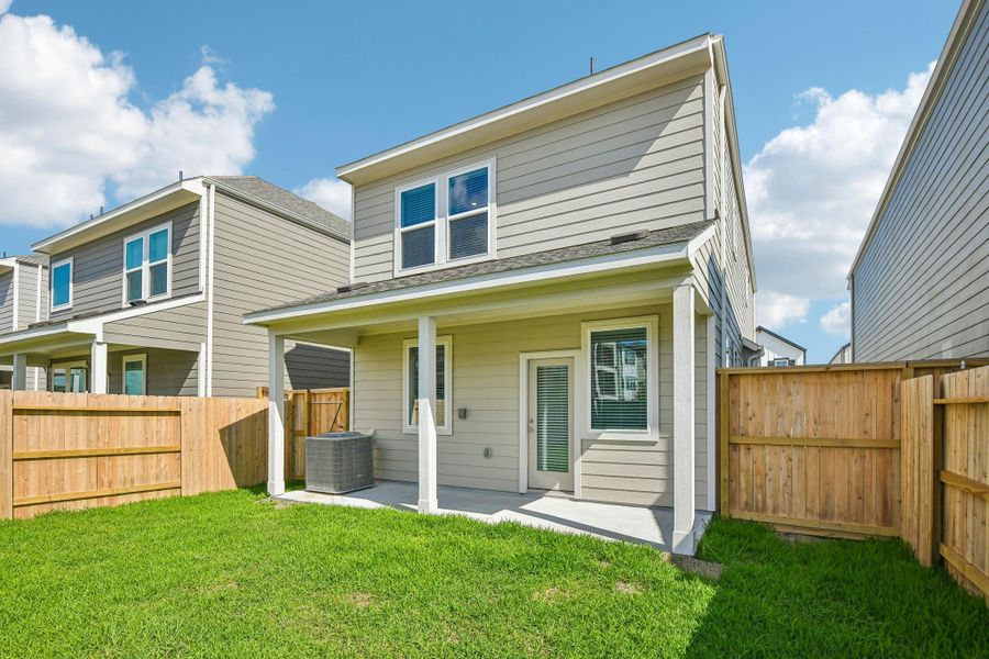 Exterior details and patio area of a home in Parkway Commons - City Series, Missouri City (Image 28).