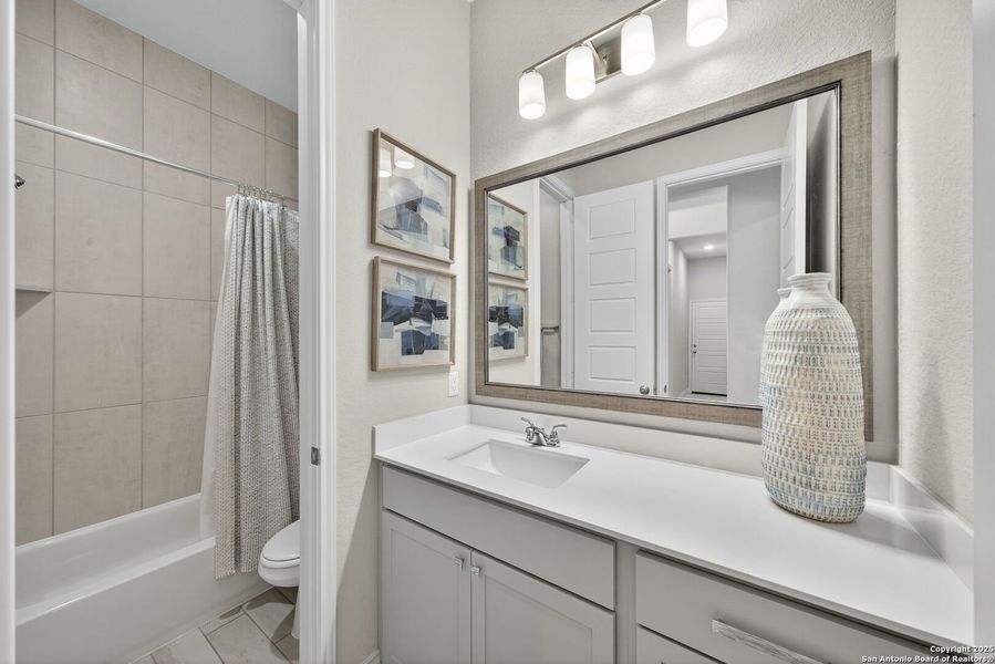 Furnished interior view inside a new home in Cibolo Canyons 60', San Antonio (Image 18).