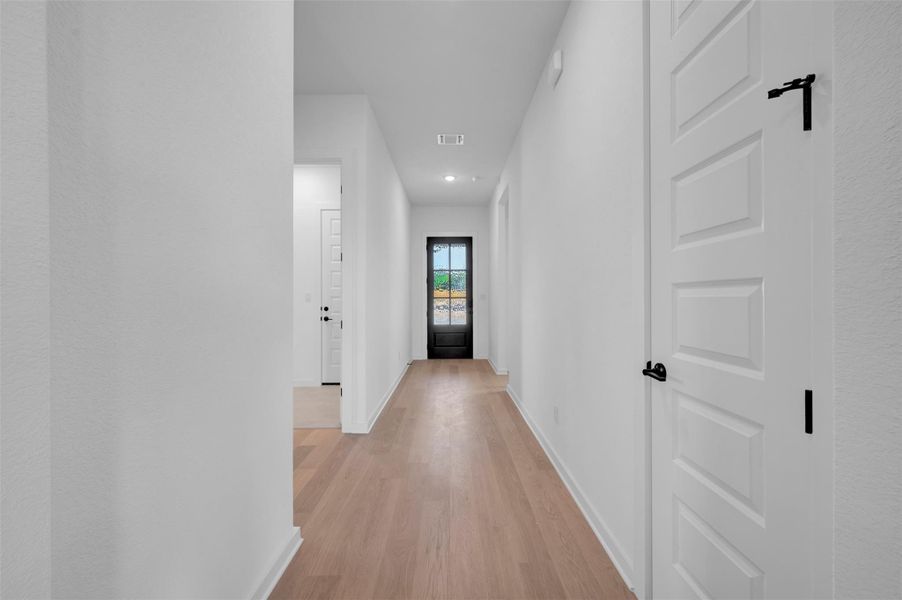 Spacious, unfurnished interior of a new home in Heritage, Dripping Springs (Image 28).