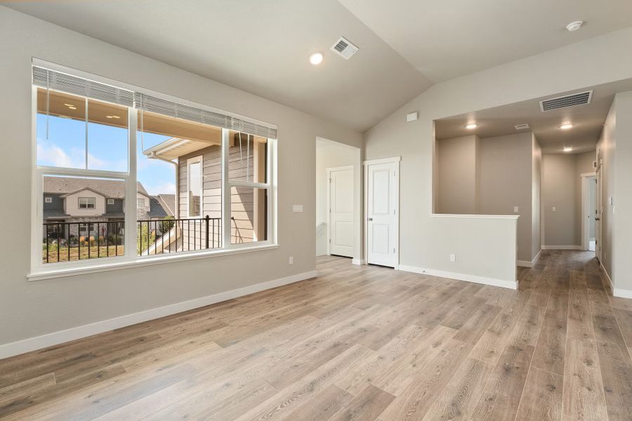 Spacious, unfurnished interior of a new home in The Lakes at Centerra - Discovery, Loveland (Image 21).