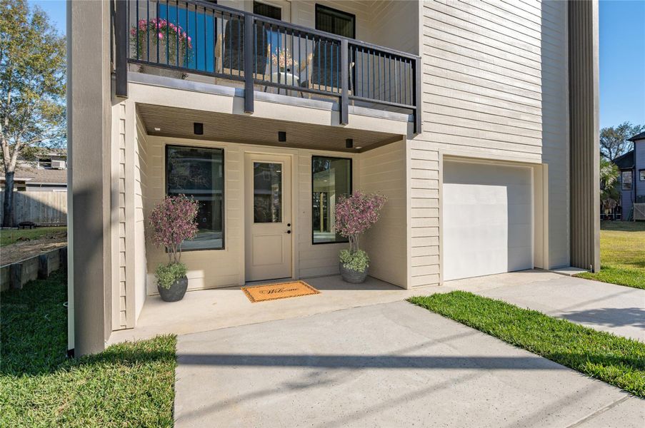Charming curb appeal with covered front patio