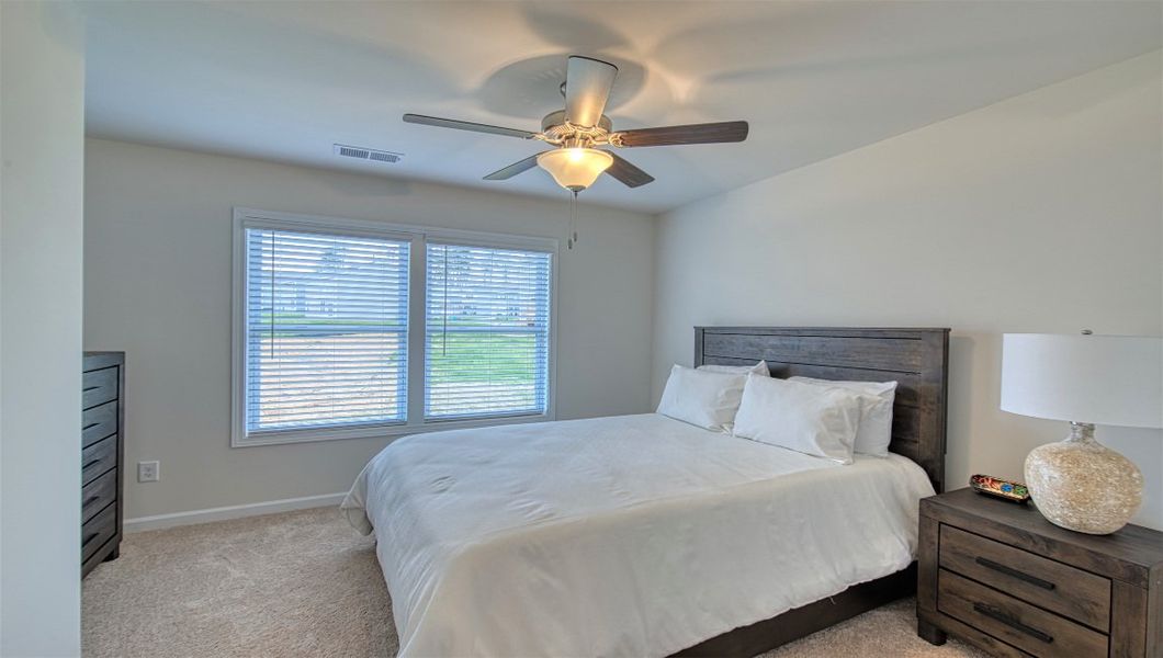 Furnished interior view inside a new home in Townes at Tap Root Farms, Fletcher (Image 21). Furnished interior view inside a new home in Townes at Tap Root Farms, Fletcher (Image 21).