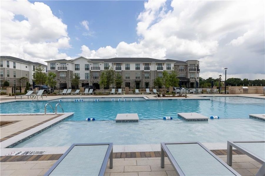 Resort style pool with lots of seating