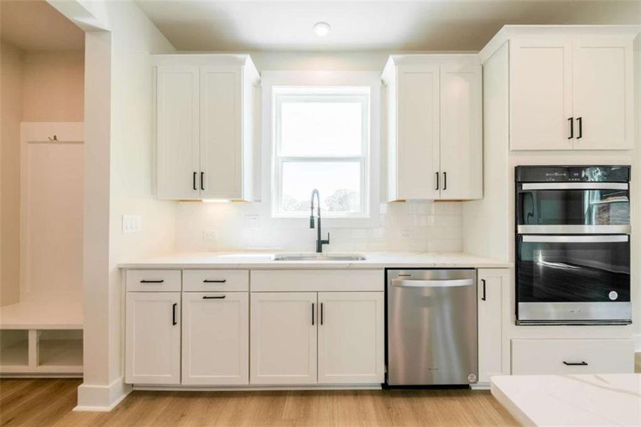 Furnished interior view inside a new home in The Paddocks at Doc Hughes, Buford (Image 12).