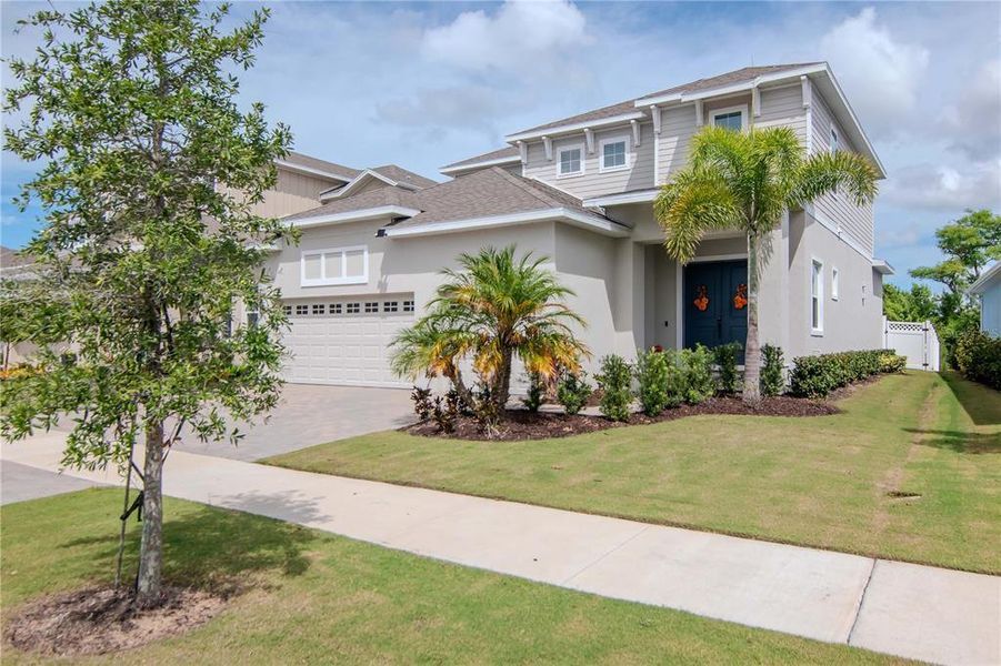 Front exterior of a new home in , Apollo Beach, FL, highlighting curb appeal (Image 2). Front exterior of a new home in , Apollo Beach, FL, highlighting curb appeal (Image 2).