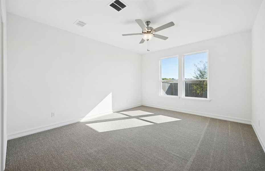 Elegant owner's suite with large windows