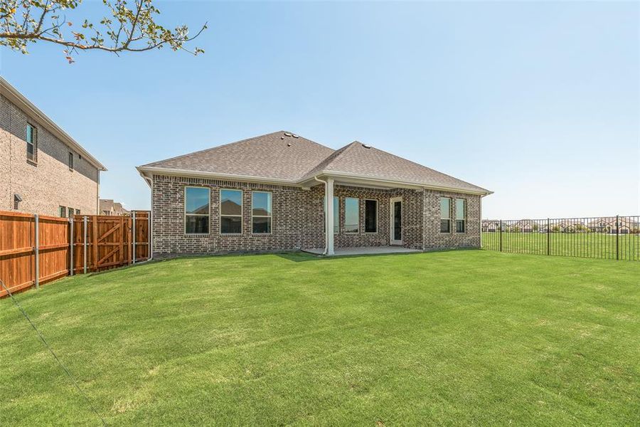 Front exterior of a new home in Villages of Creekwood, Frisco, TX, highlighting curb appeal (Image 19). Front exterior of a new home in Villages of Creekwood, Frisco, TX, highlighting curb appeal (Image 19).