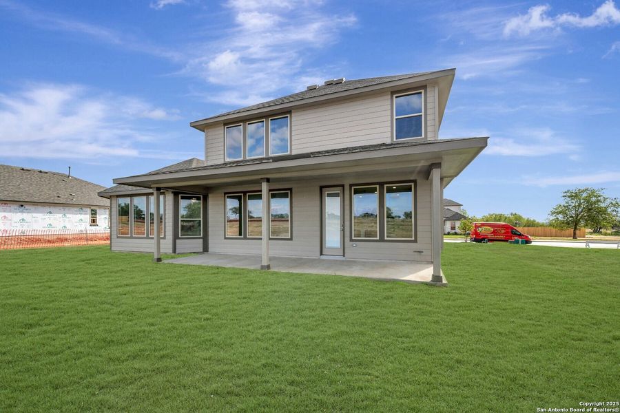 Exterior details and patio area of a home in Preserve at Annabelle Ranch, San Antonio (Image 3).