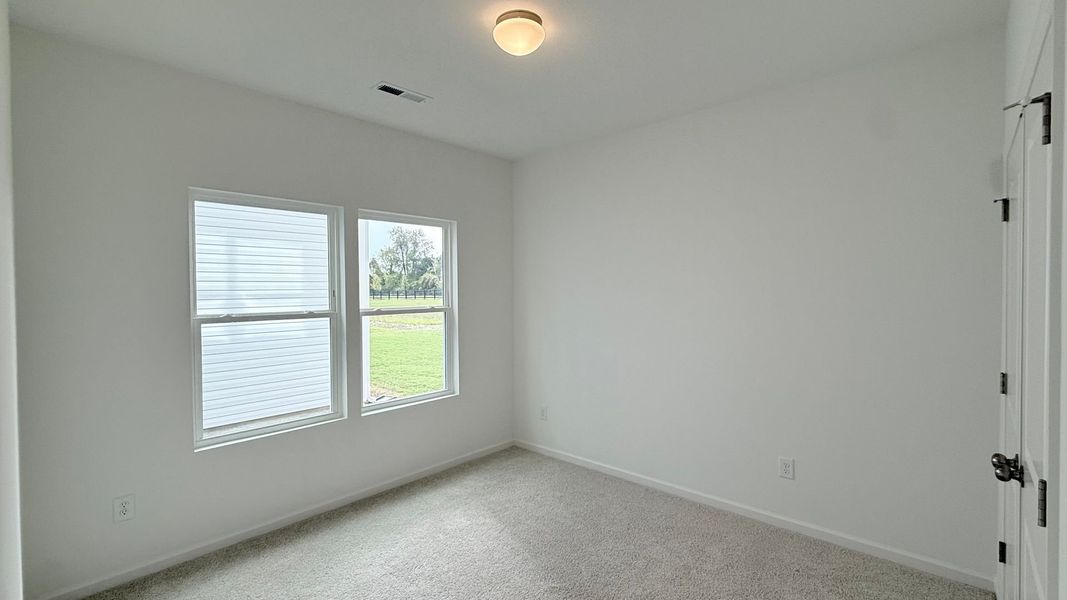 Spacious, unfurnished interior of a new home in Nathans Ridge, Lillington (Image 16).