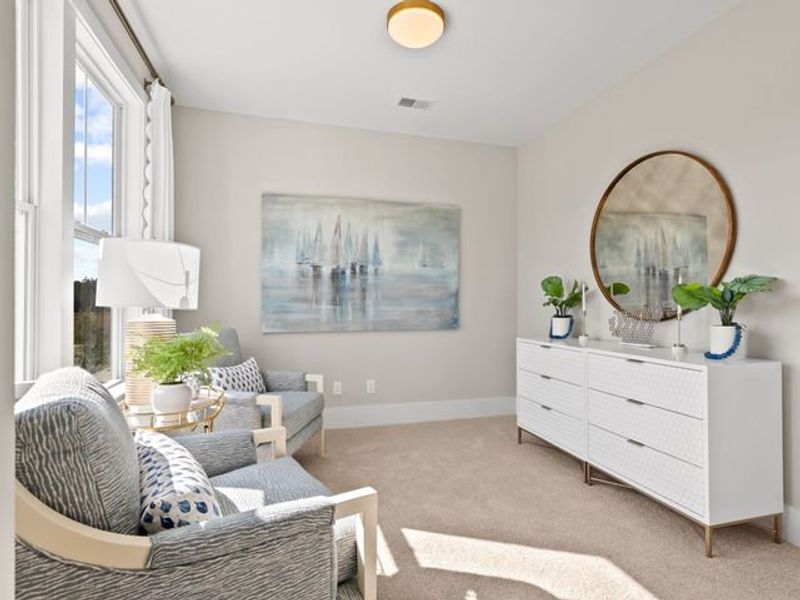 Representative furnished interior of a home built from the Jasper P by True Homes in Homecoming, Ravenel (Image 15).