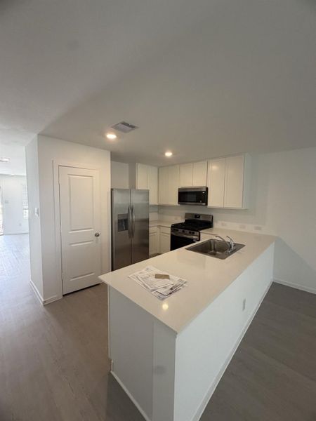 Furnished interior view inside a new home in Sweetgrass Village, Crosby (Image 15).