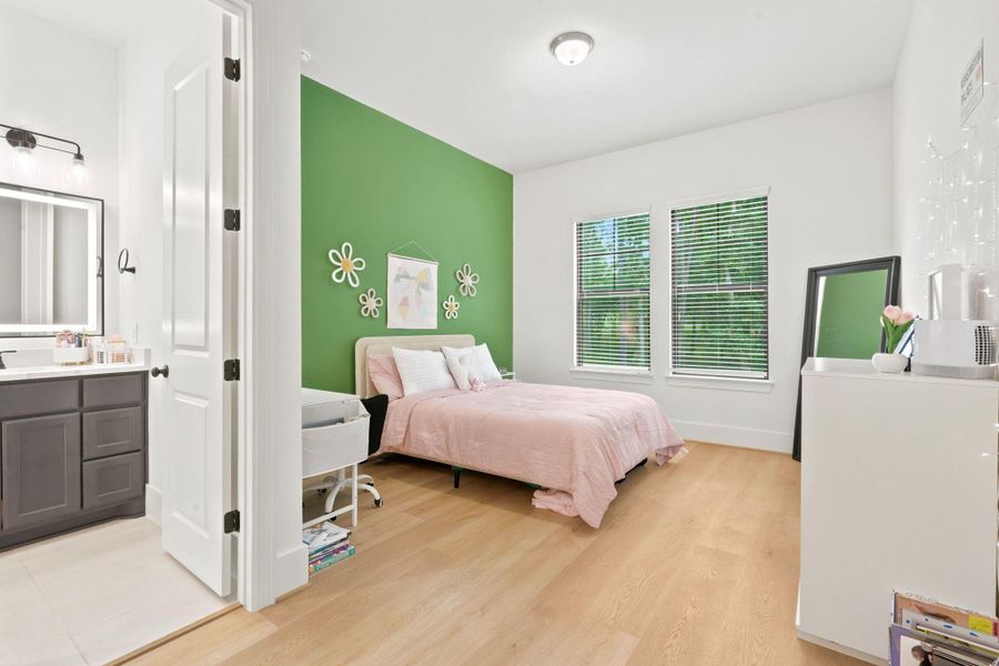 Furnished interior view inside a new home in , New Waverly (Image 33).