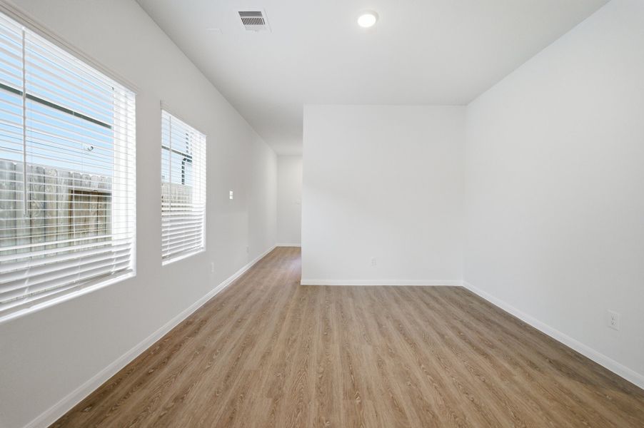 Spacious, unfurnished interior of a new home in The Pines at Seven Coves, Willis (Image 14).