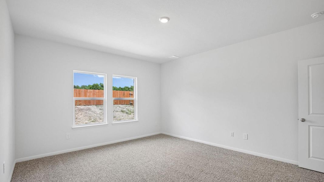 Spacious, unfurnished interior of a new home in Bar W Ranch, Leander (Image 22).