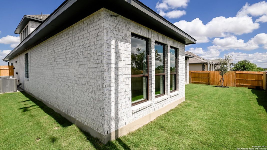 Exterior details and patio area of a home in Cibolo Valley Heights 65', Cibolo (Image 3).